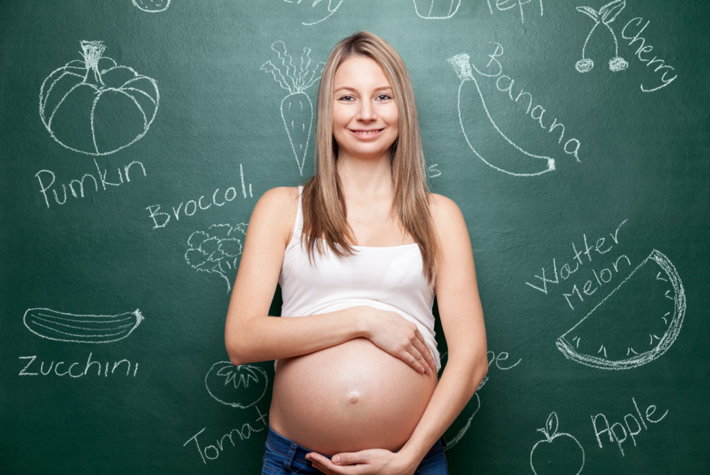 Pregnant woman focused on healthy nutrition